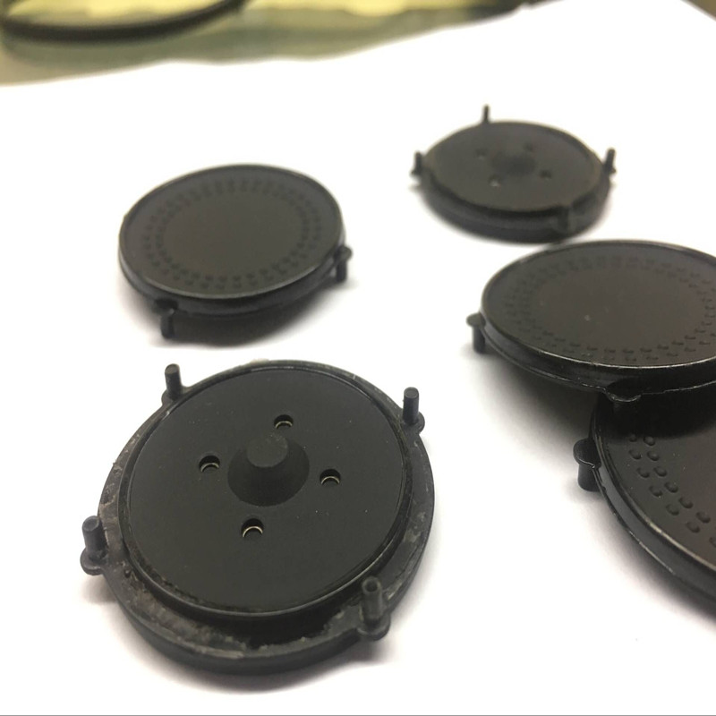專業生産(chǎn)音樂播放器防震矽膠彈片 圓形矽膠包塑膠五金按鍵
